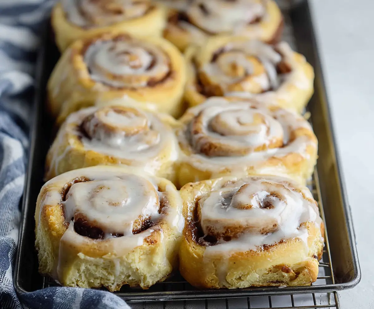 Delicious 30-minute sourdough discard cinnamon rolls with swirled cinnamon sugar filling and creamy icing.