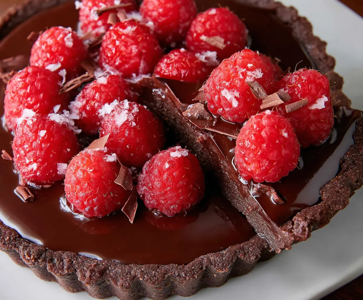 Delicious chocolate raspberry tart, perfect for Valentine's Day desserts.