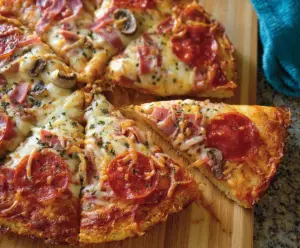 Gluten-free pizza dough fresh out of the oven ready to serve.